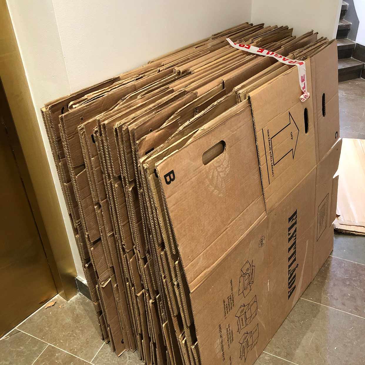 image of Folded moving boxes - Stockholm