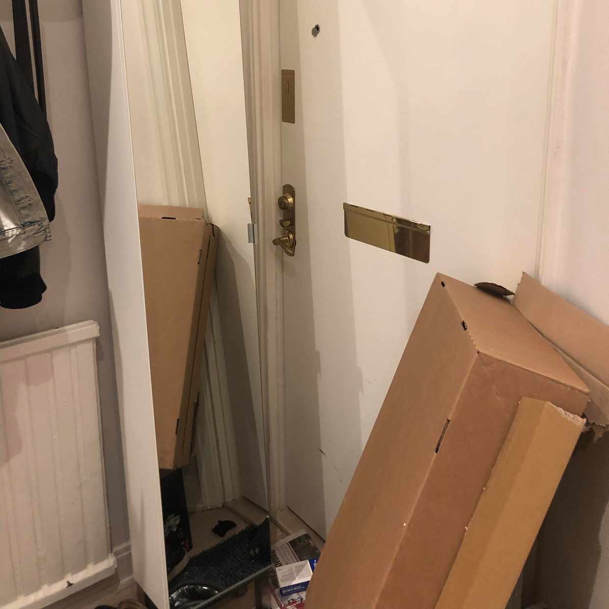 image of Cardboard boxes + closet - Stockholm