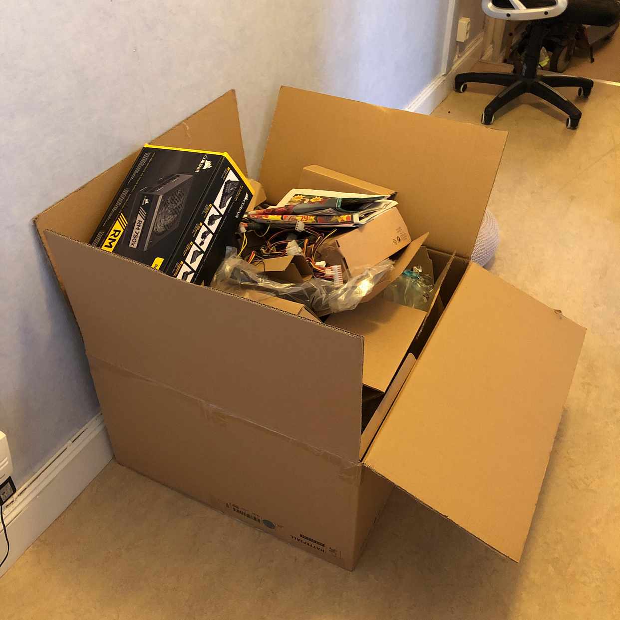 image of Office chair & boxes - Stockholm City