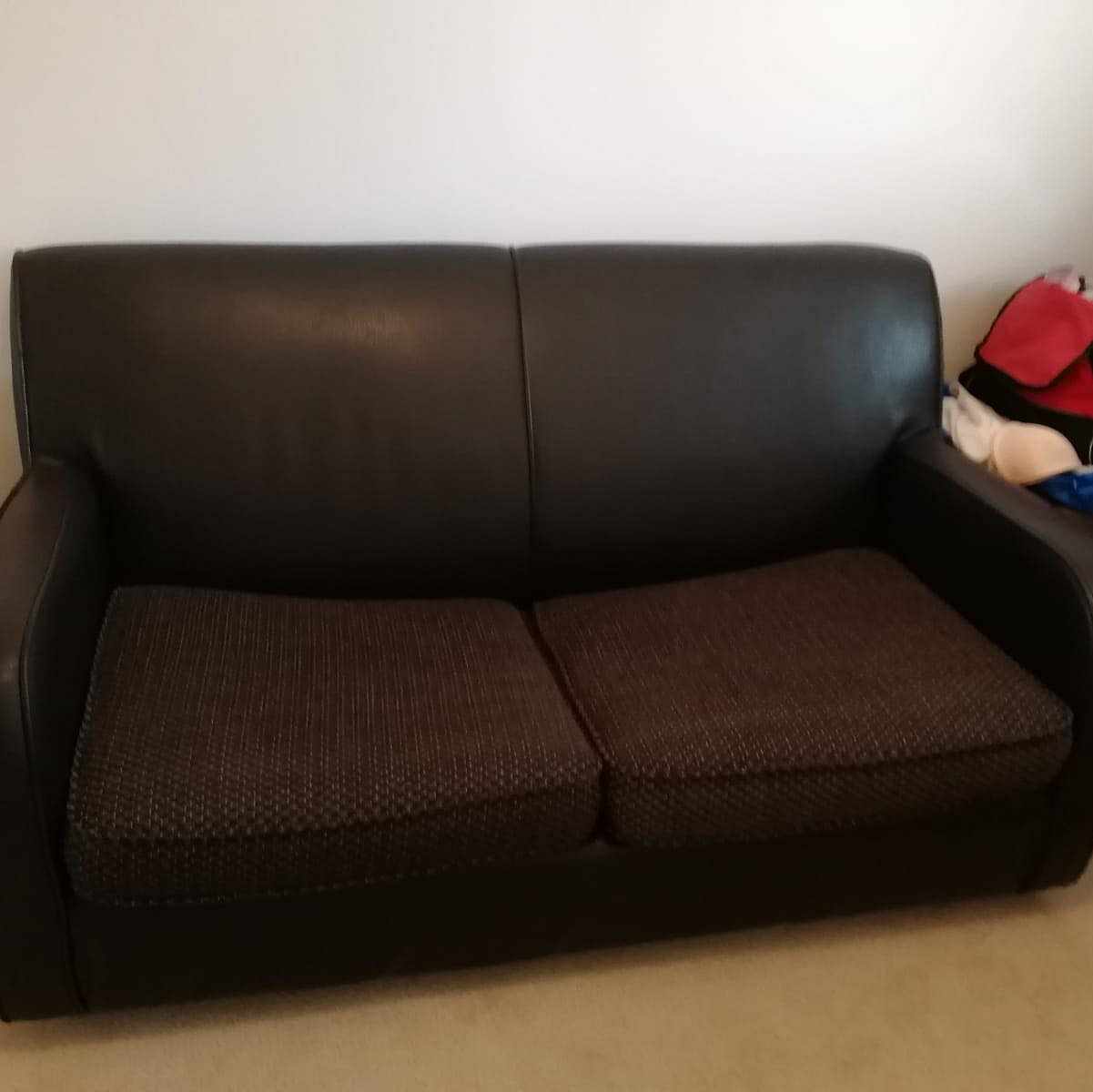 image of Two seater sofa bed - Romford