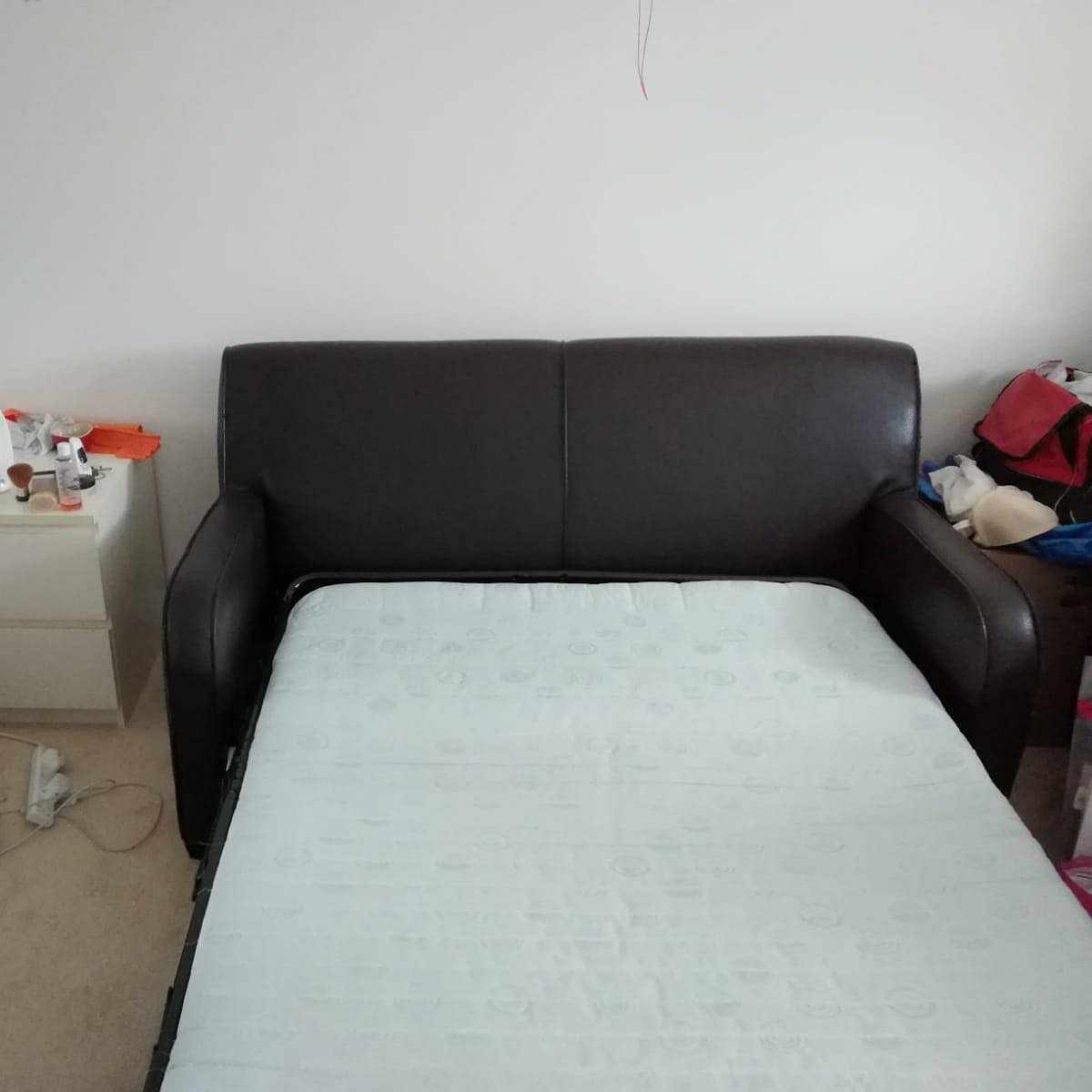 image of Two seater sofa bed - Romford