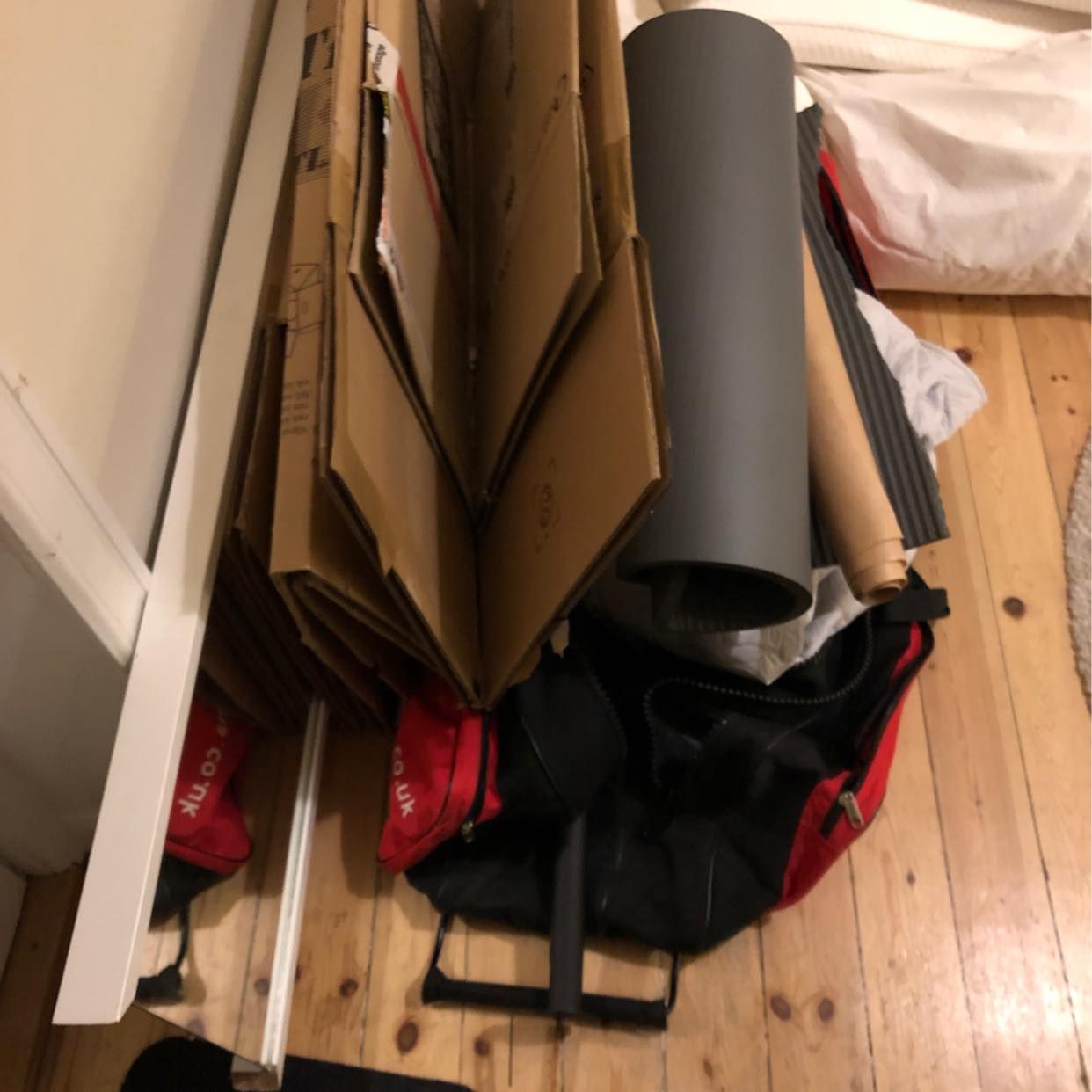 image of Boxes, bag, duvet, mirror - Stockholm