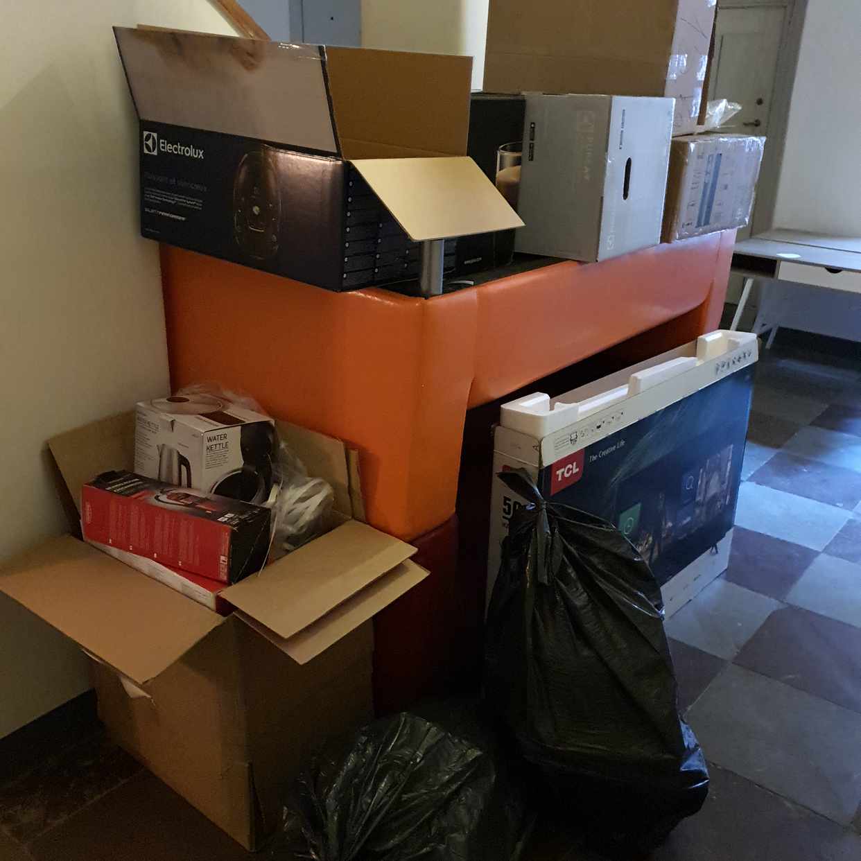 image of Cardboard boxes, 2 sofa - Stockholm