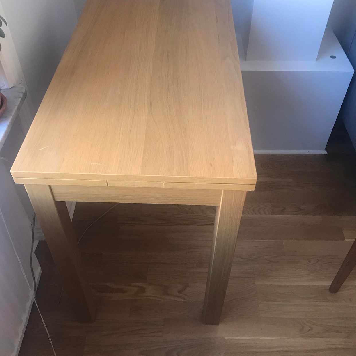 image of En tvåsittssoffa och bord - Stockholm