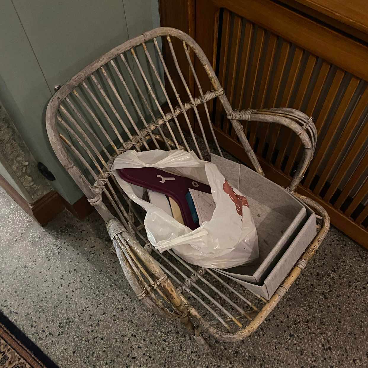image of Old chair + waste bag - Stockholm