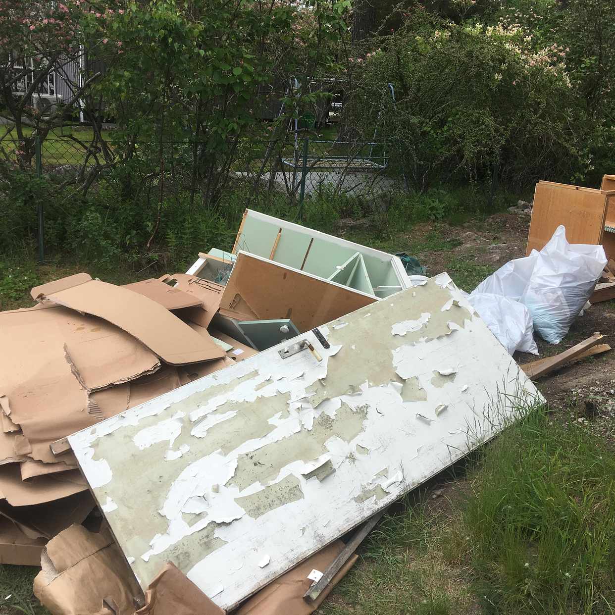 image of Cardboard, wood and door - Haninge
