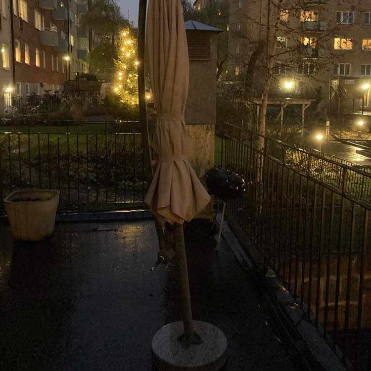 image of Flytt ett solparasoll - 