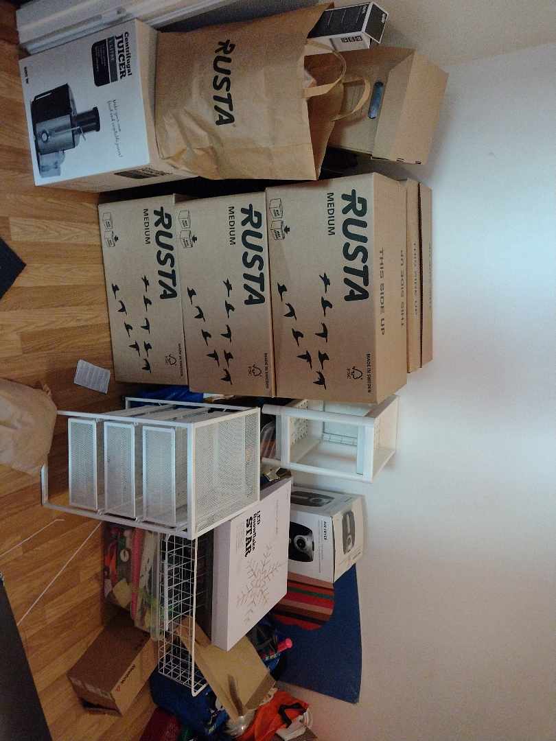 image of Few boxes, bags, and TV - 