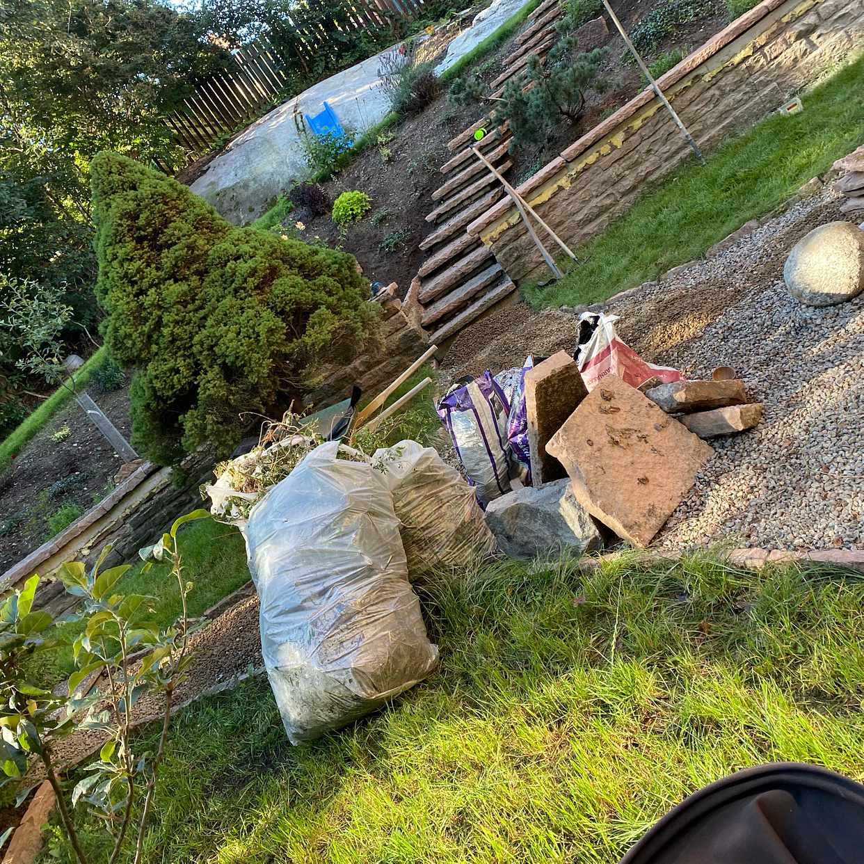 image of stones, garden waste wood - Solna