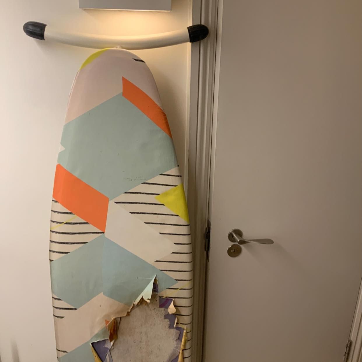 image of Ironing board and iron - London