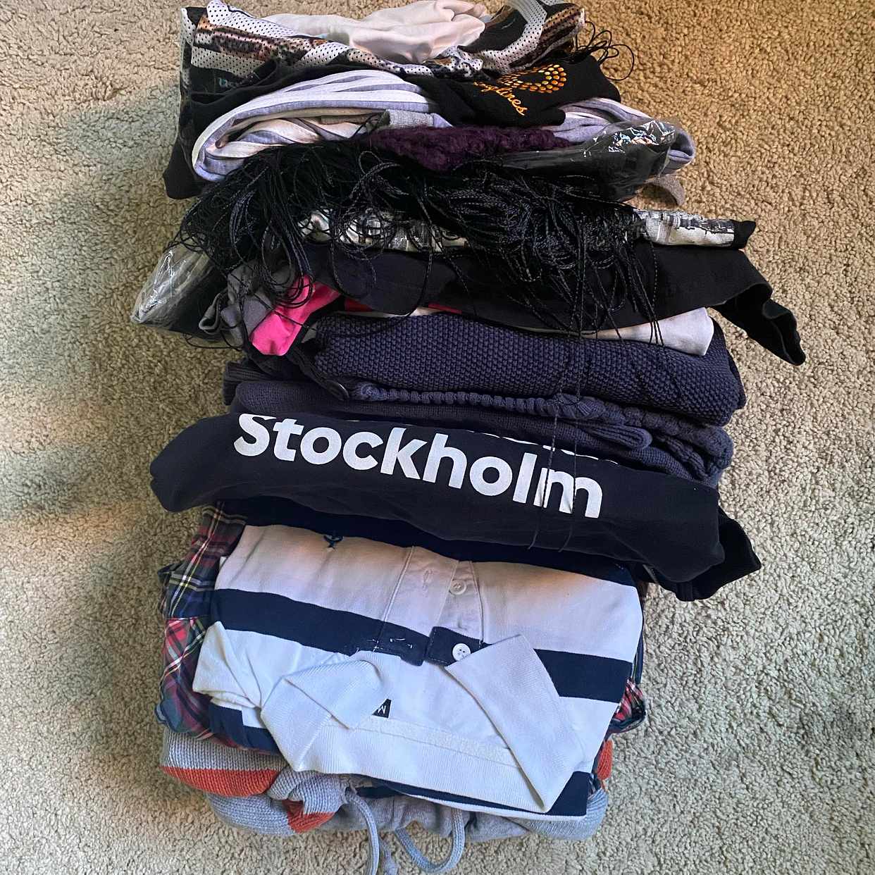 image of Lots of male clothes - Stockholm