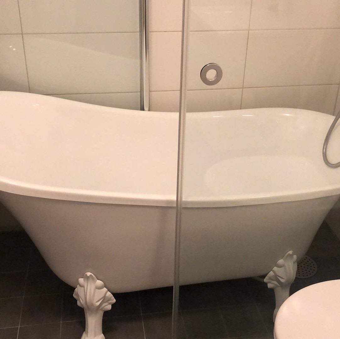 image of Hämta & lämna ett badkar - 