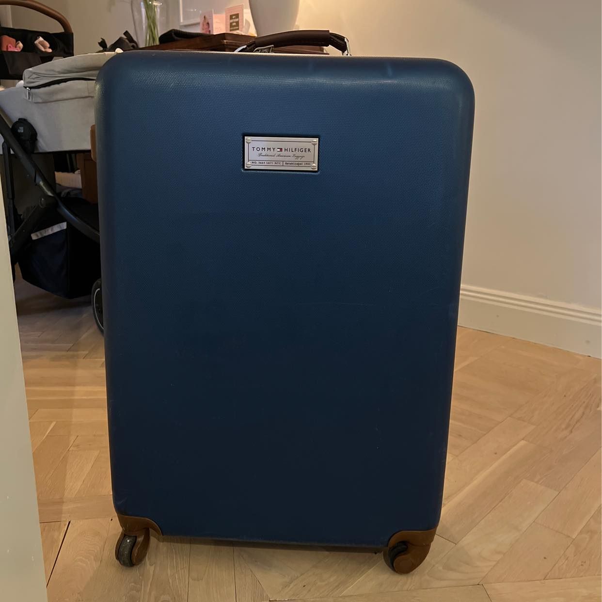 image of Old suitcase with content - Stockholm