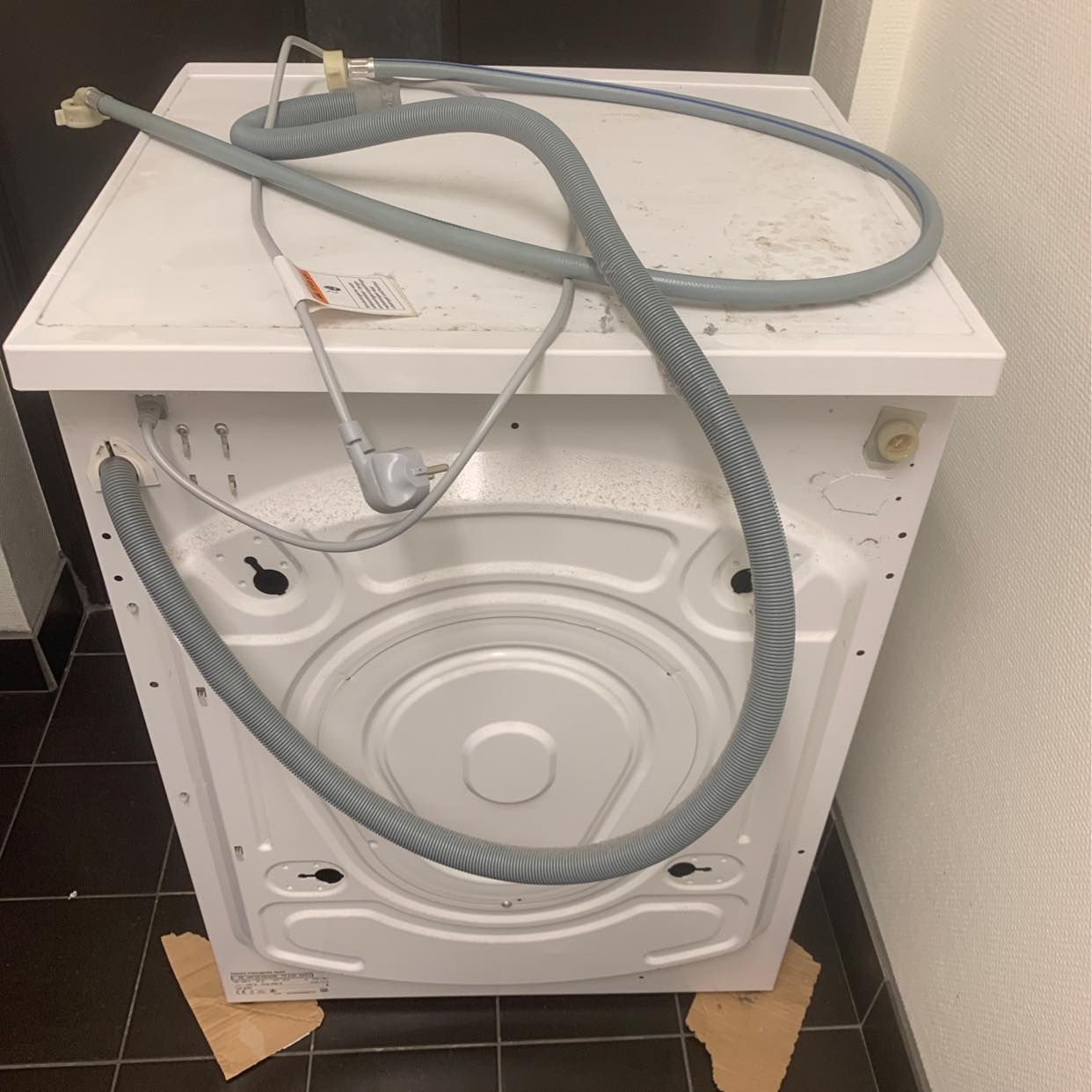 image of Hämta upp en tvättmaskin - Huddinge