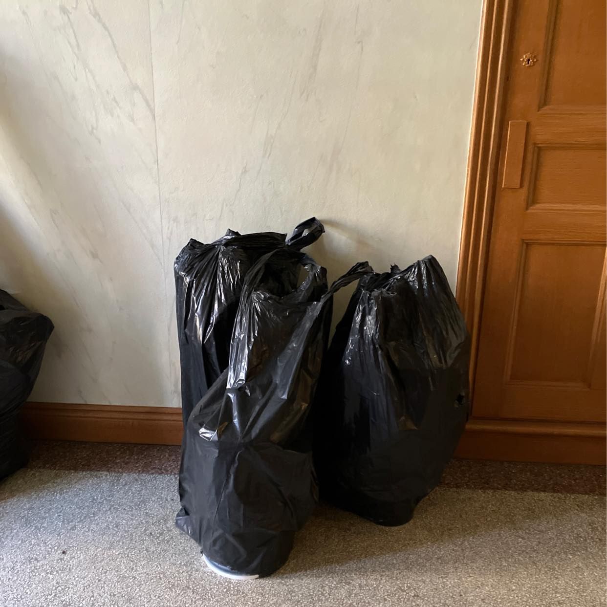 image of 5black bag/table / carpet - Stockholm City