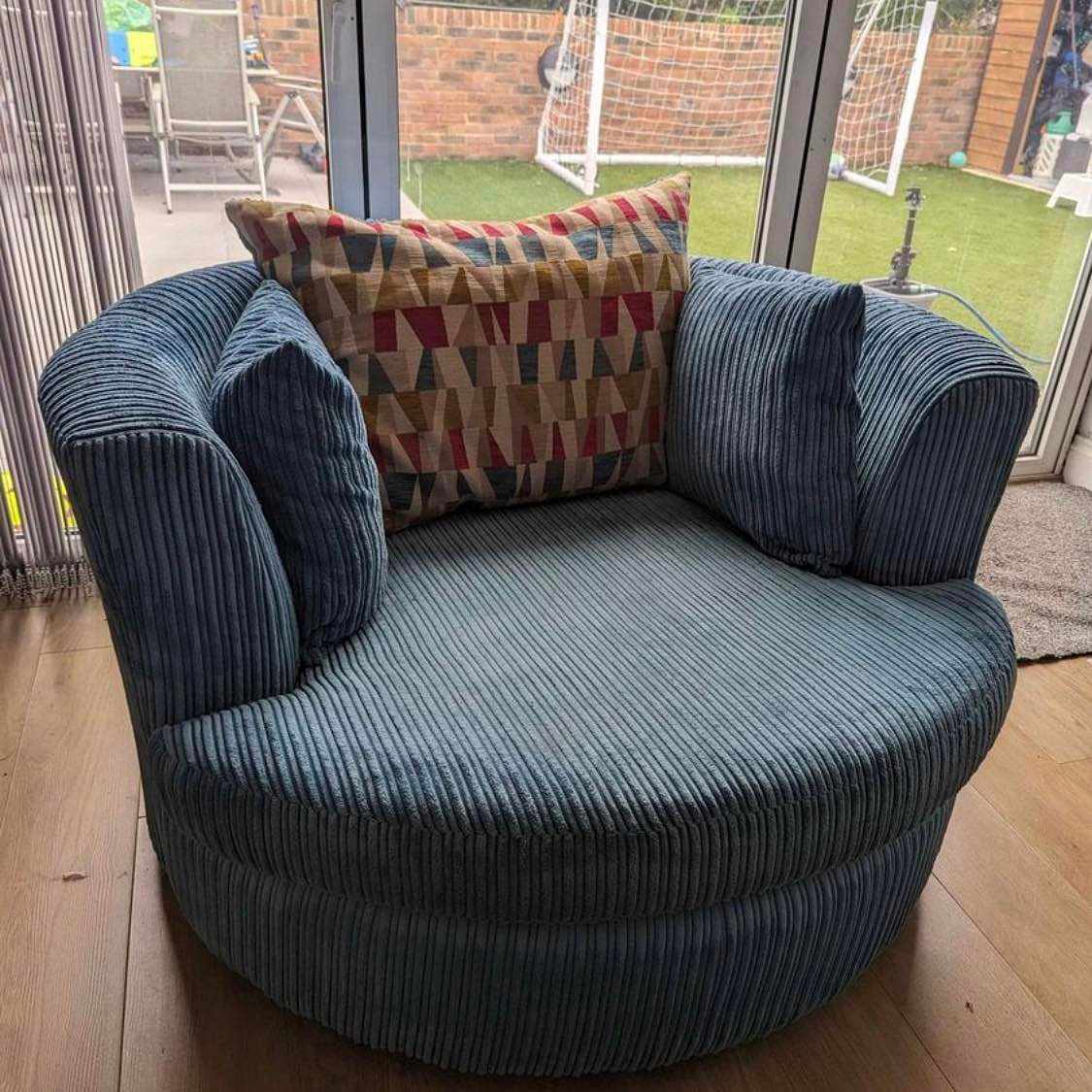image of Blue Swivel Chair & stall - 