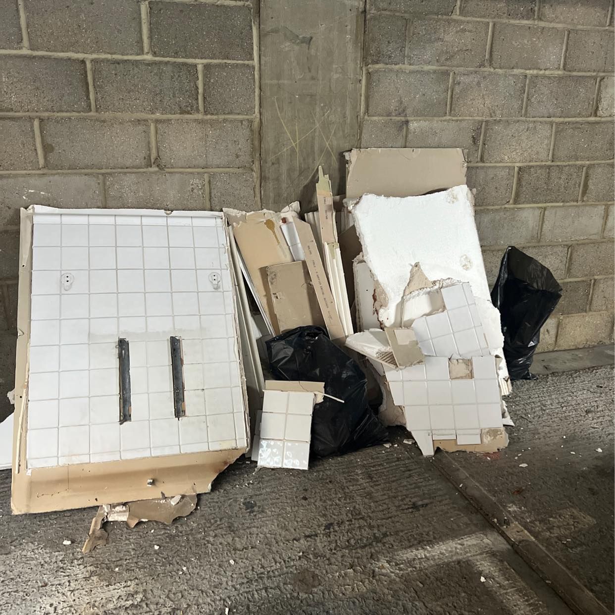 image of Tiles and plasterboard - London