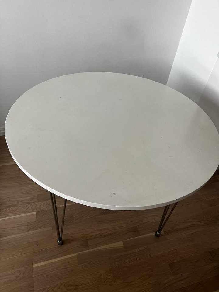 image of Runt matbord med stålben - 