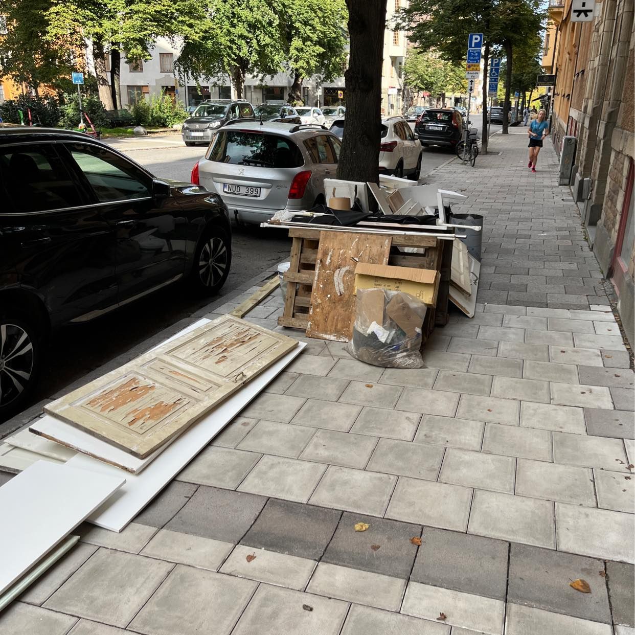 image of Old doors, pallets, waste - Stockholm