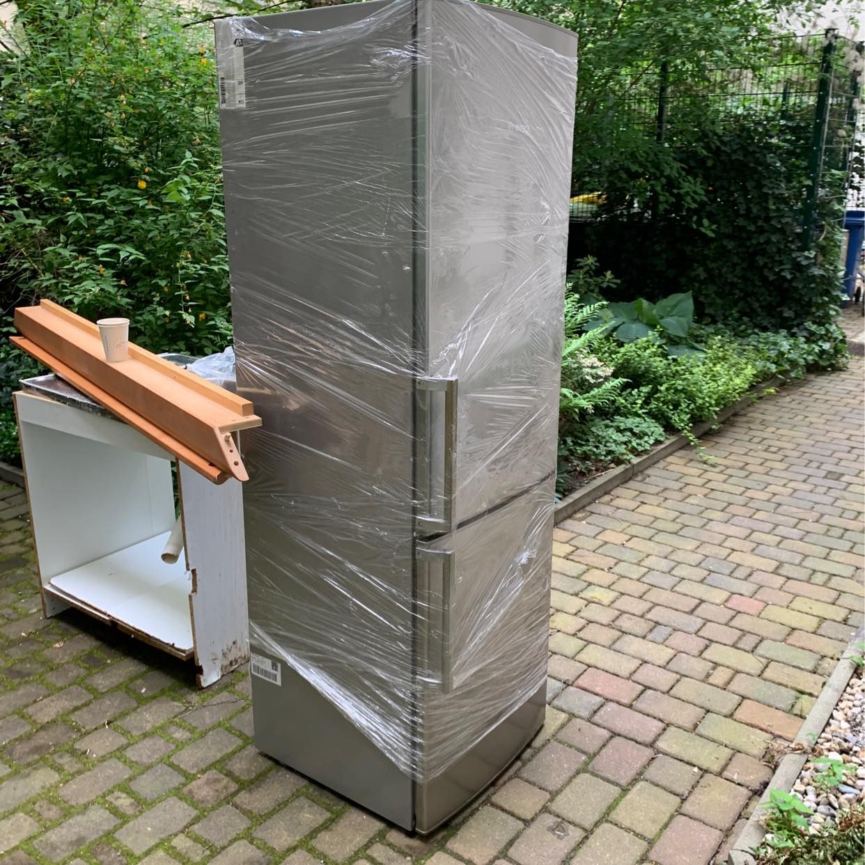 image of carry a fridge 3rd floor - 