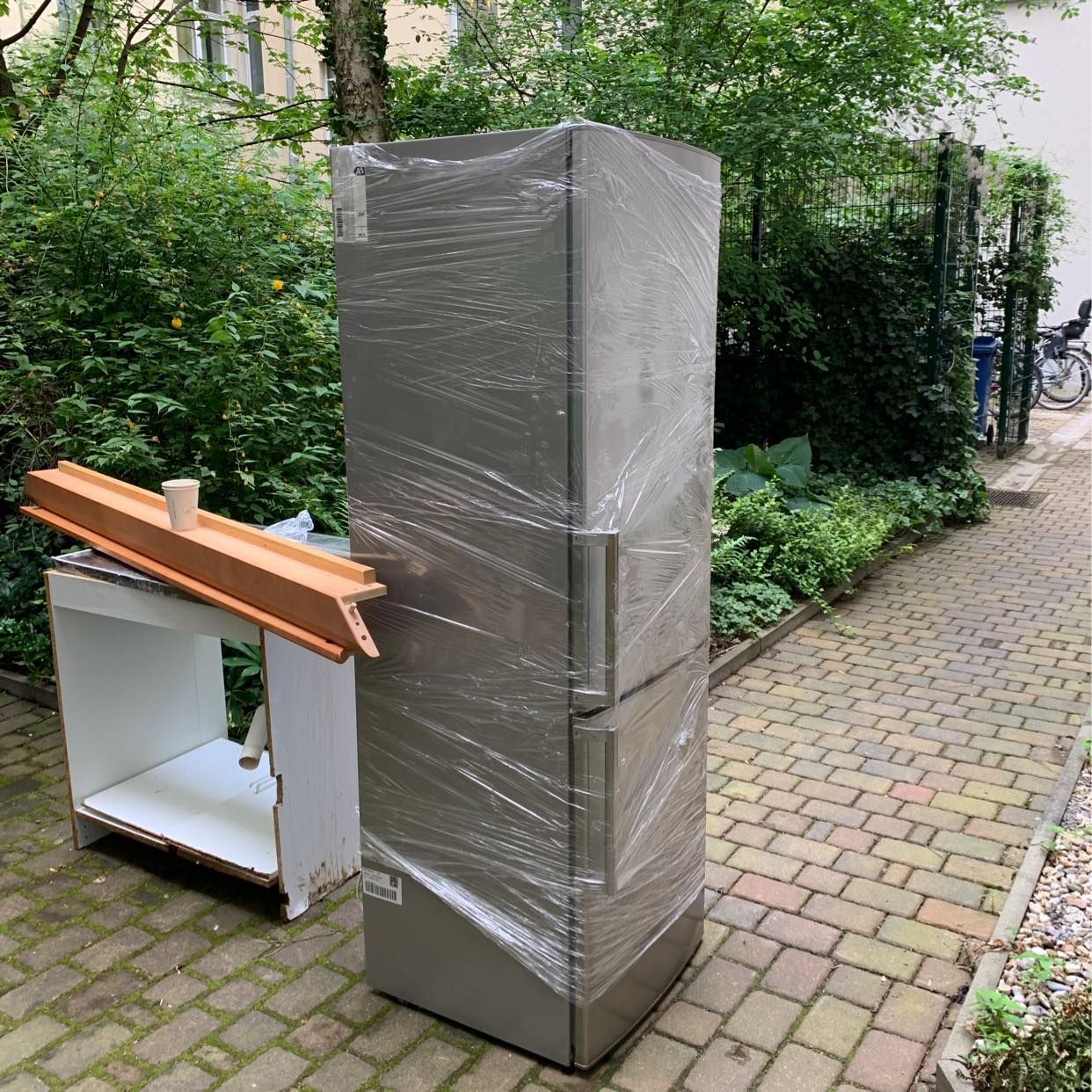 image of carry a fridge 3rd floor - 