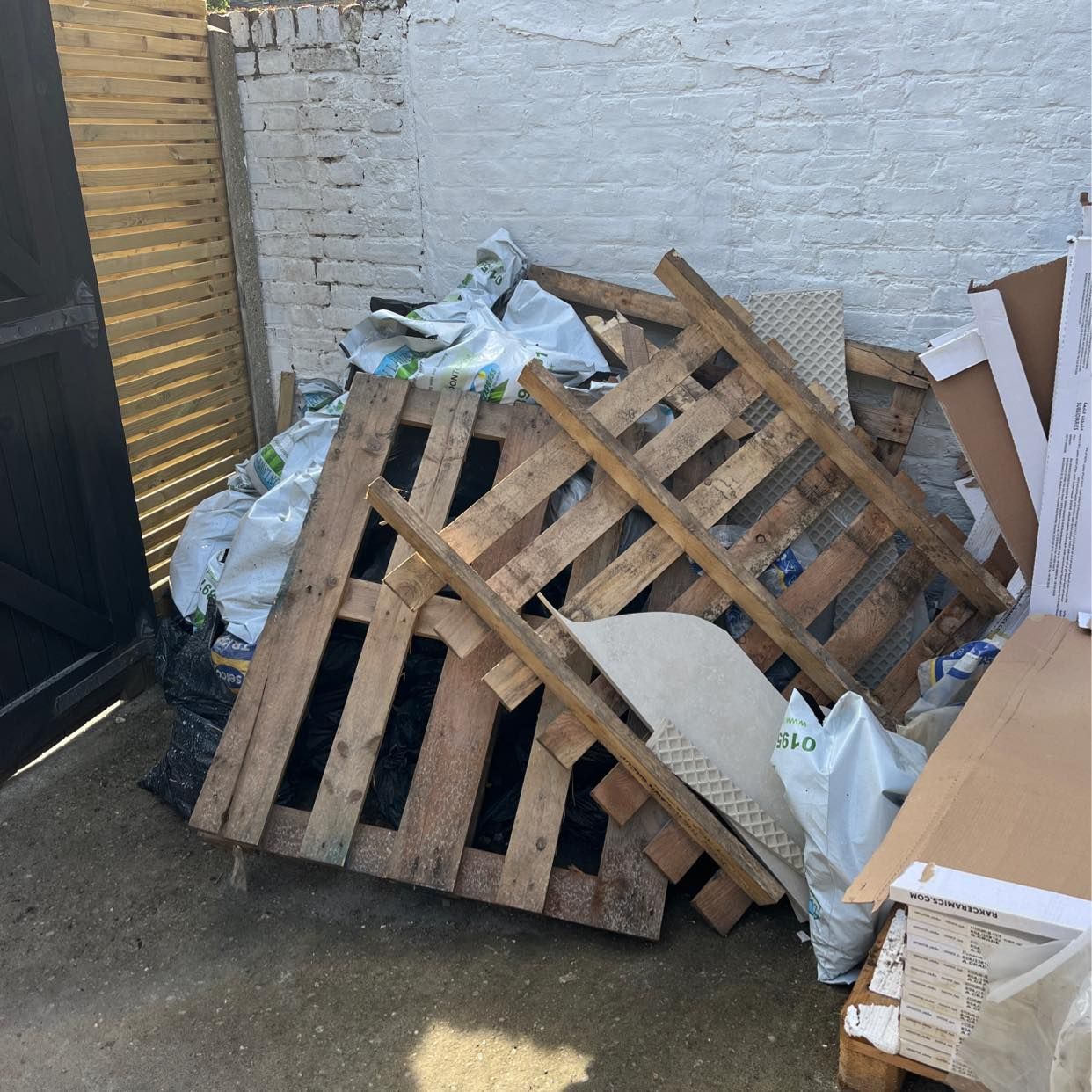 image of Old carpet & Garden Waste - London