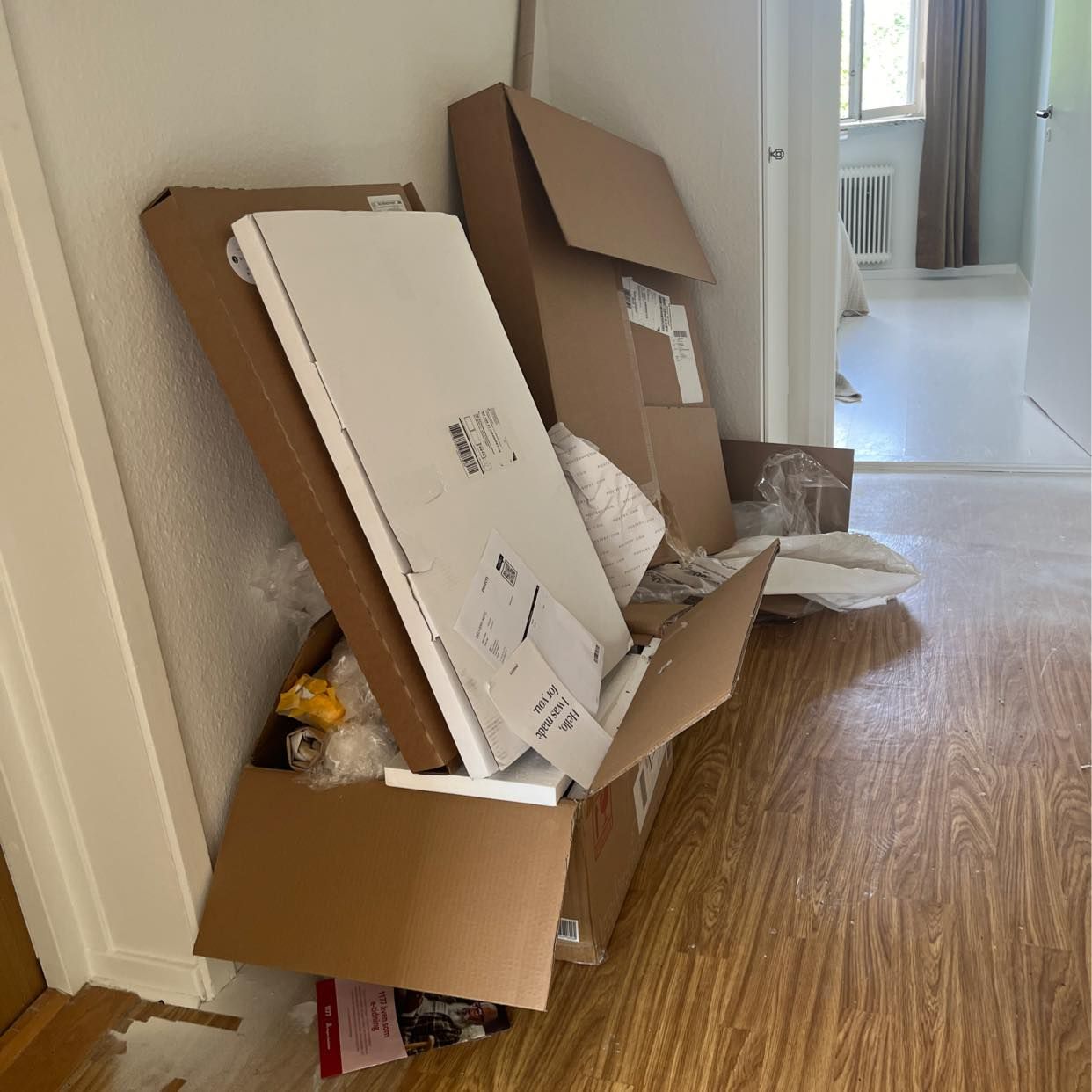 image of Removing cardboard. - Hägersten