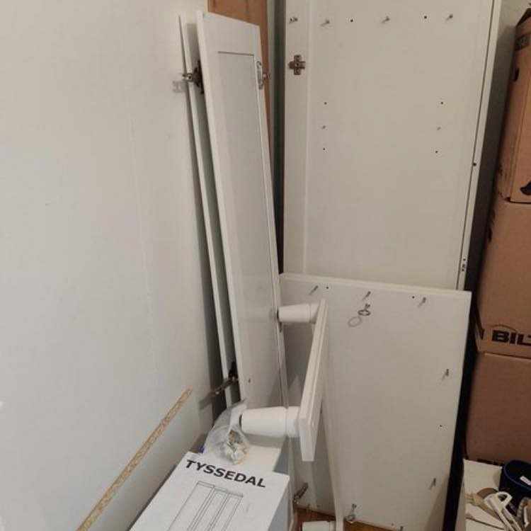 image of Flytta nedmonterat skåp - 