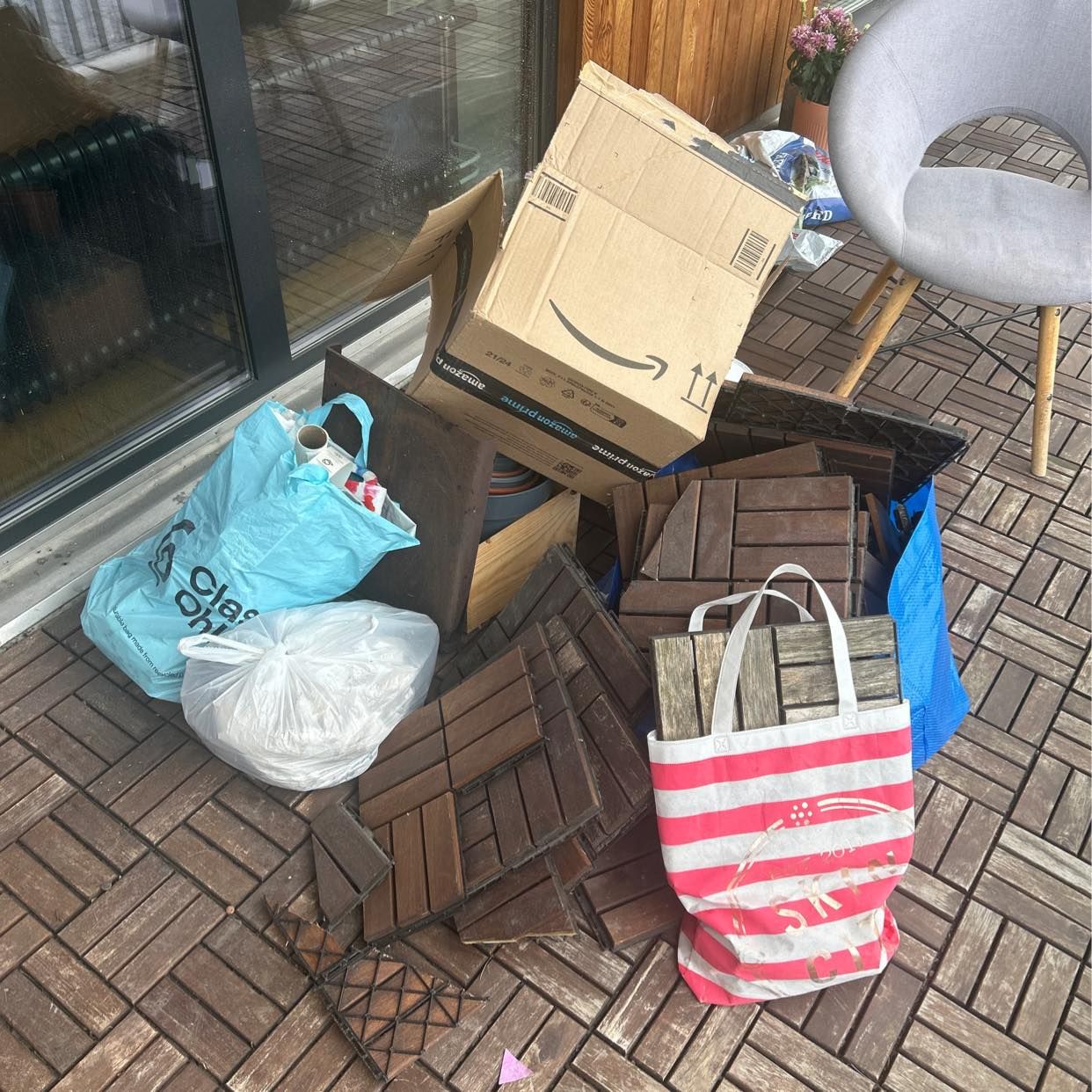 image of Cardboard, garden waste - Stockholm