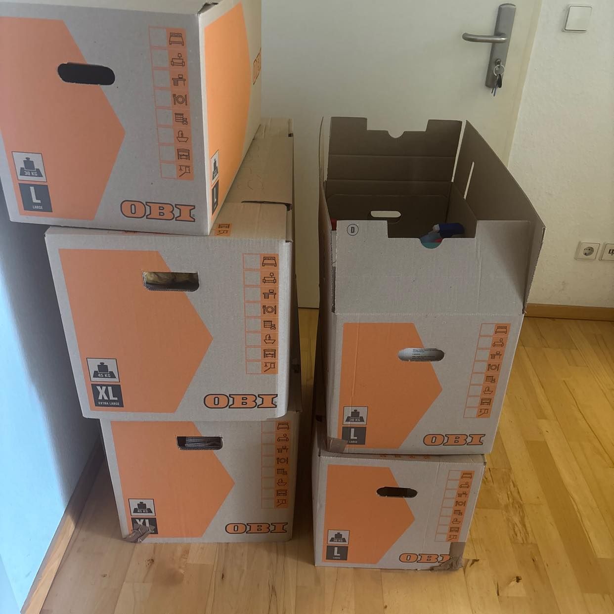 image of Boxes and some few bags - 