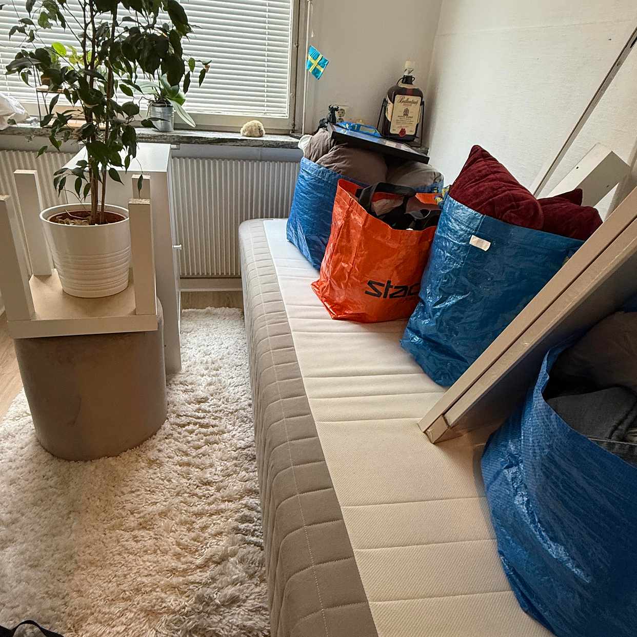 image of Flytta säng, 7 kartonger - 
