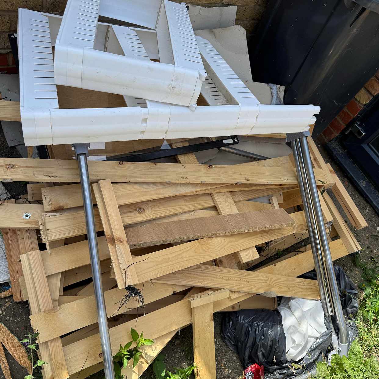 image of Broken furniture and a ma - London