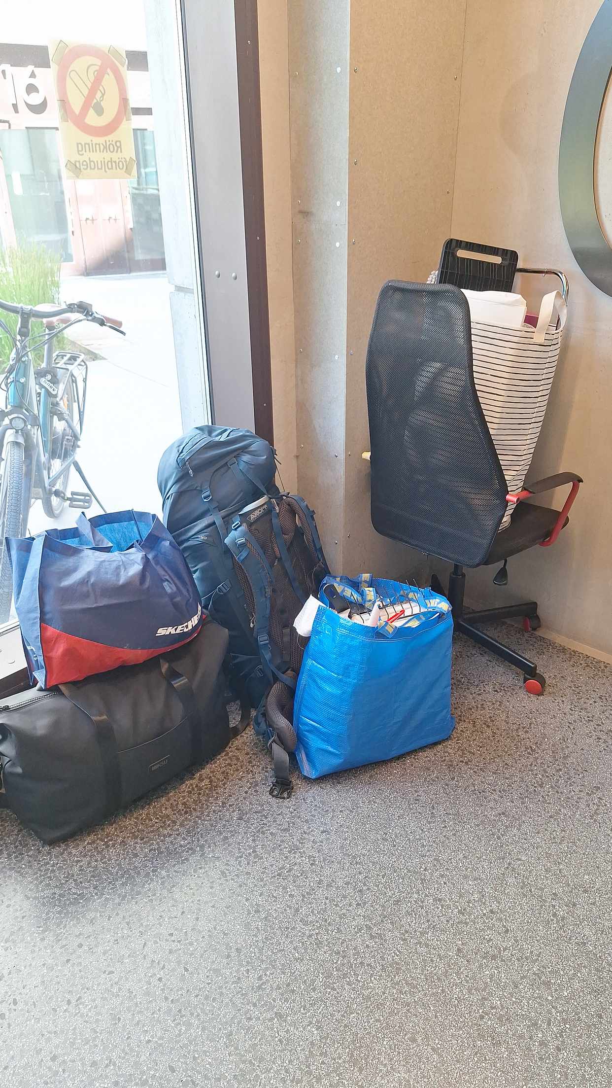 image of 3 bags and a office chair - 