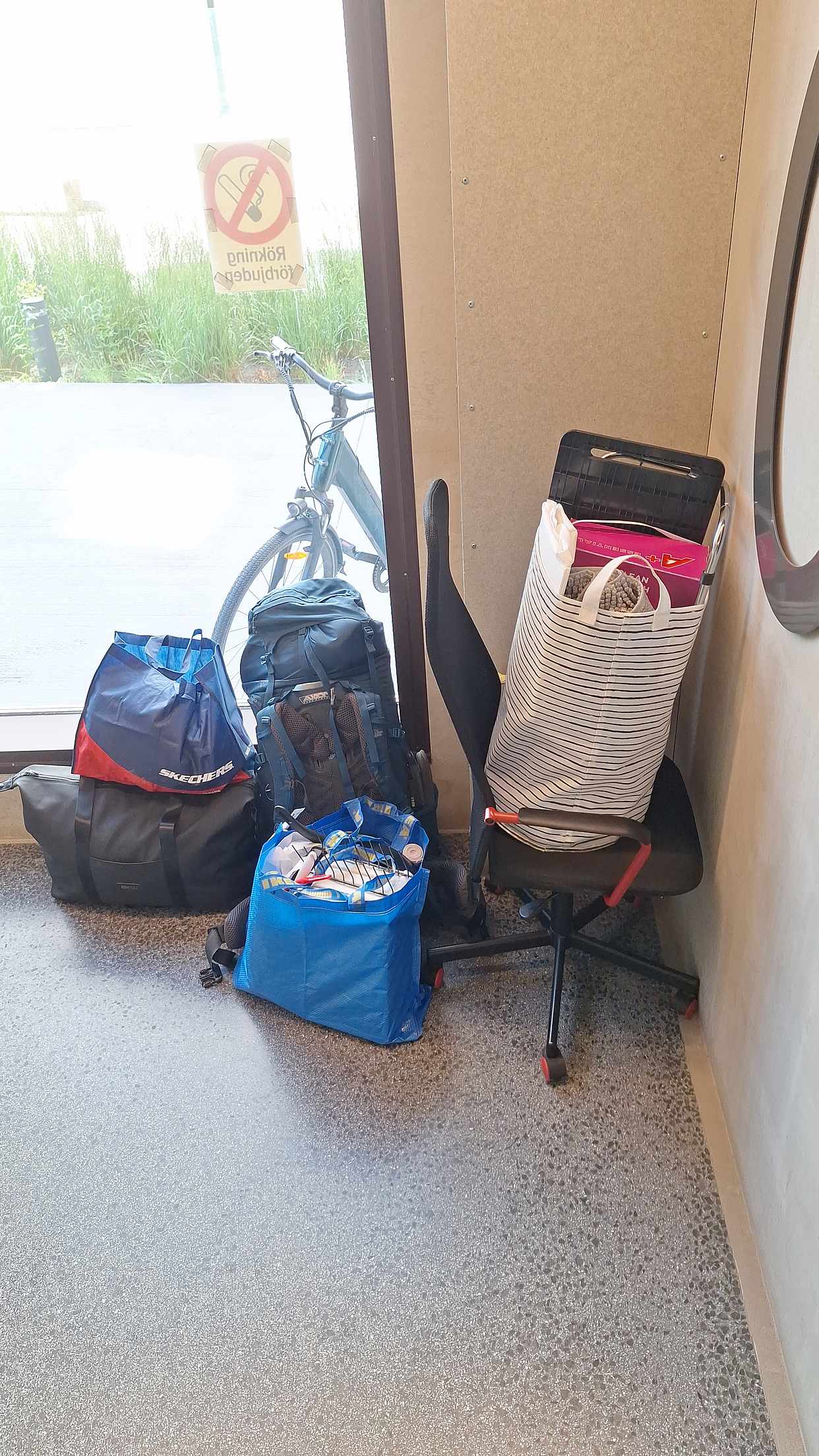 image of 3 bags and a office chair - 